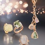 Capolavoro Capriccio Ringe und Collier vor grauem Hintergrund