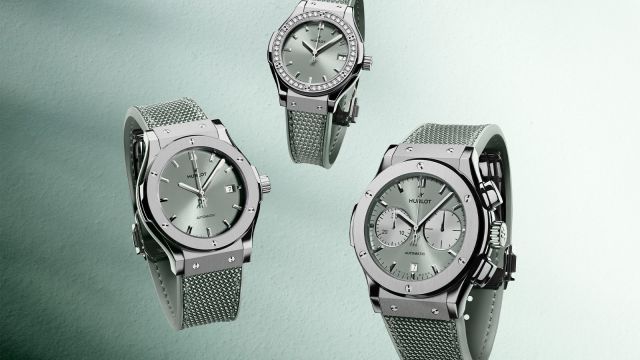 Drei Hublot Classic Fusion Uhren mit salbeifarbenem Zifferblatt, Edelstahlgehäuse und Textilarmband, eine Variante mit Diamantlünette