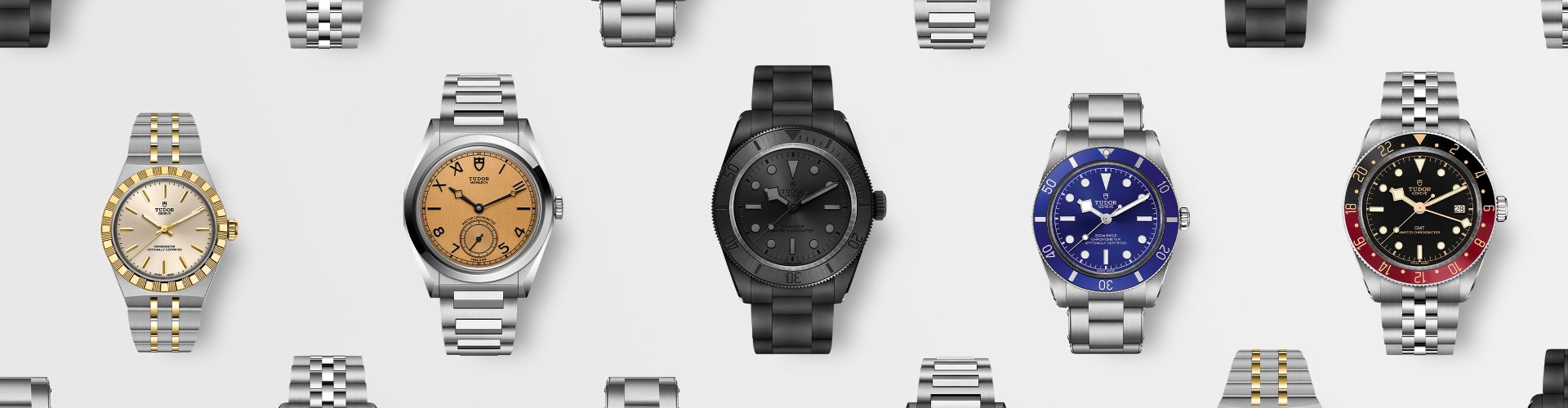 Tudor Armbanduhren Kollektion mit verschiedenen Modellen – darunter Taucheruhren und klassische Designs in Edelstahl, Schwarz und Blau, hochwertig inszeniert auf hellem Hintergrund