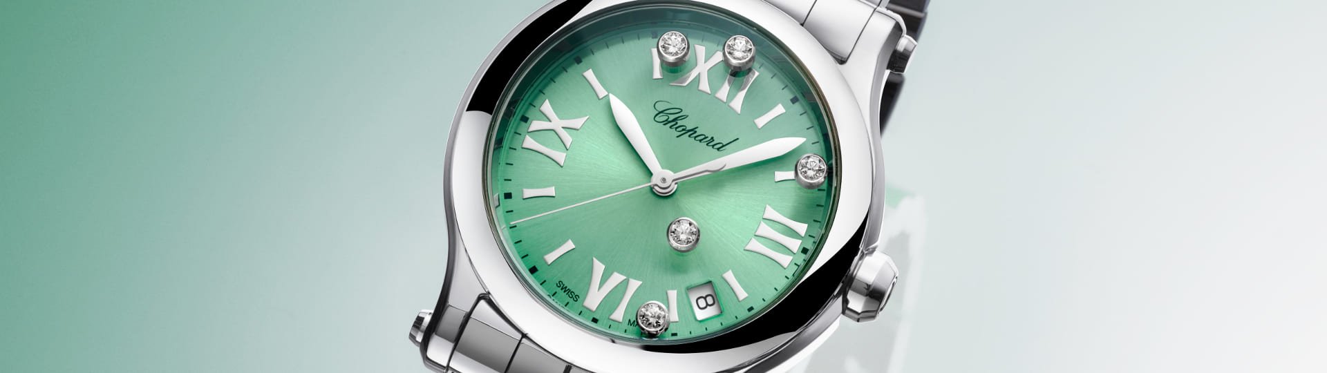 Chopard Happy Sport Uhr in Stahl mit mintgruenem Zifferblatt mit fuenf beweglichen Diamanten auf hellgruenem Hintergrund