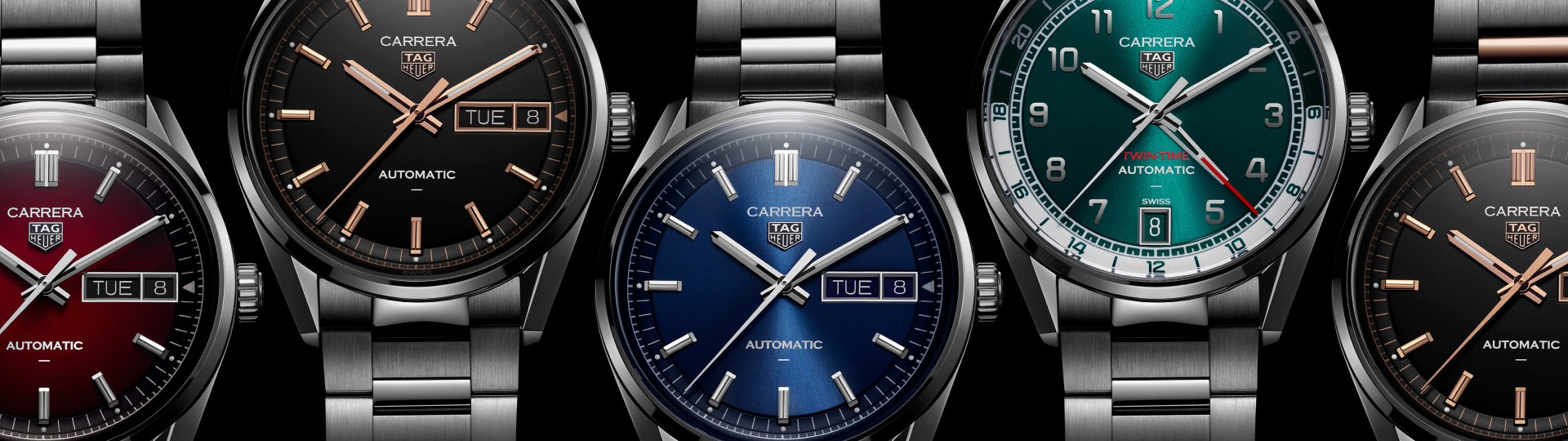 Mehrere TAG Heuer Day-Date Uhren nebeneinander liegend vor schwarzem Hintergrund