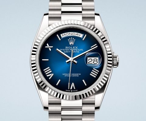 Rolex Day-Date Armbanduhr aus Edelstahl mit blauem Zifferblatt, geriffelter Lünette, Präsidentenarmband sowie Wochentagsanzeige und Datumsfenster mit Zykloplupe