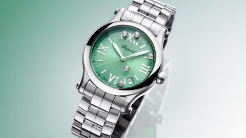 Chopard Happy Sport Uhr in Stahl mit mintgruenem Zifferblatt mit fuenf beweglichen Diamanten auf hellgruenem Hintergrund Chopard Happy Sport Uhr in Stahl mit mintgruenem Zifferblatt mit fuenf beweglichen Diamanten auf hellgruenem Hintergrund